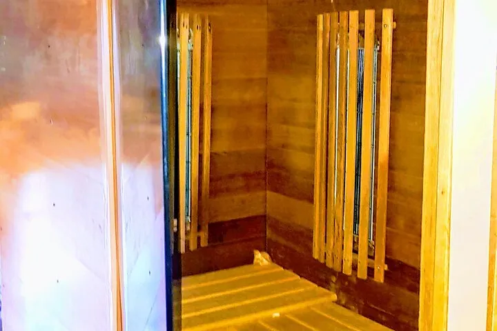 Wooden infrared sauna interior.