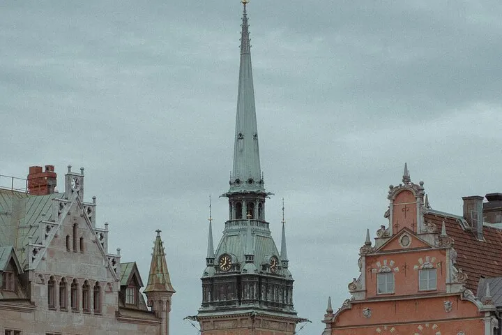 Ornate church spire and old town buildings.
