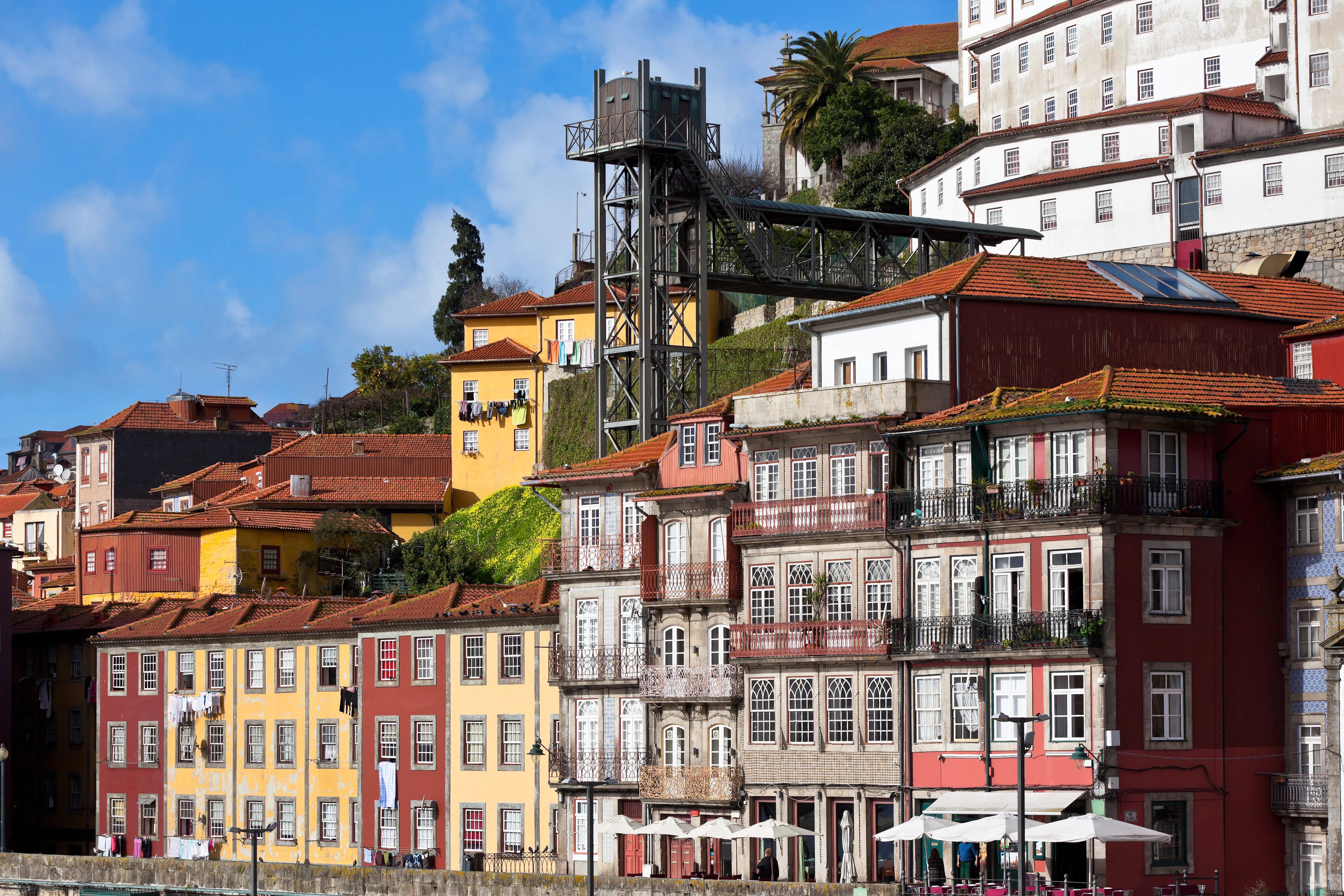 Colorful historic Porto buildings and funicular elevator.