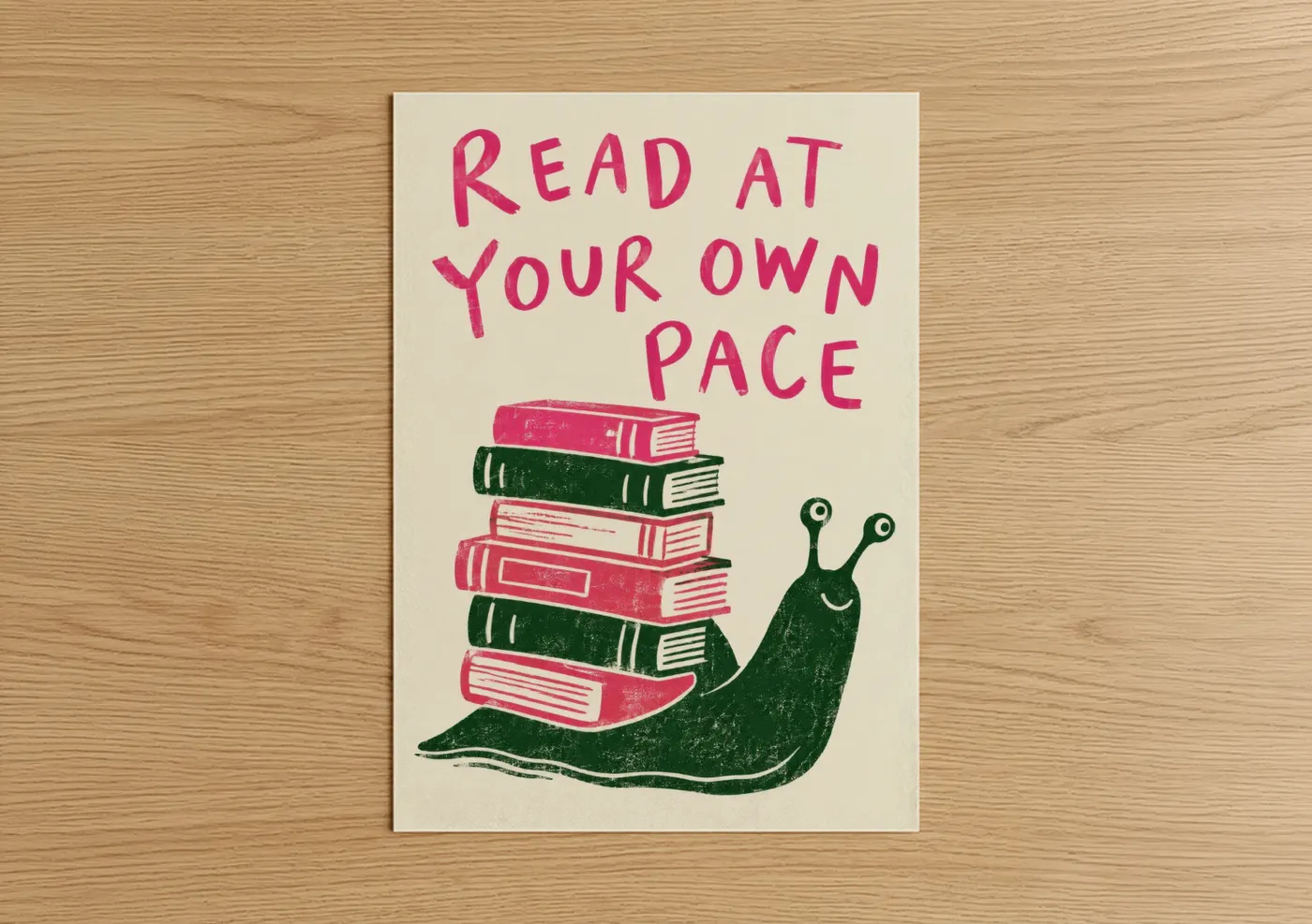 Art print on warm oak wood — pink and dark green palette — Reading Snail With Books Wall Art poster