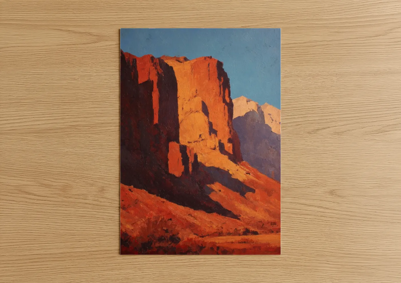 Cliff art print on warm oak wood — red and blue palette — Golden Hour Butte poster