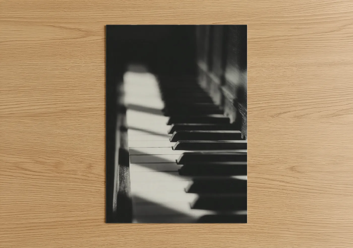 Art print on warm oak wood — black and white palette — Sunlit Piano Keys poster