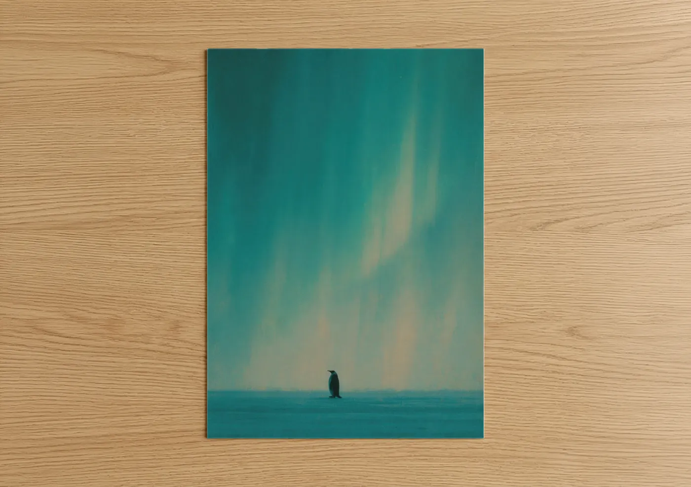 Art print on warm oak wood — teal and cream palette — Solitary Penguin poster