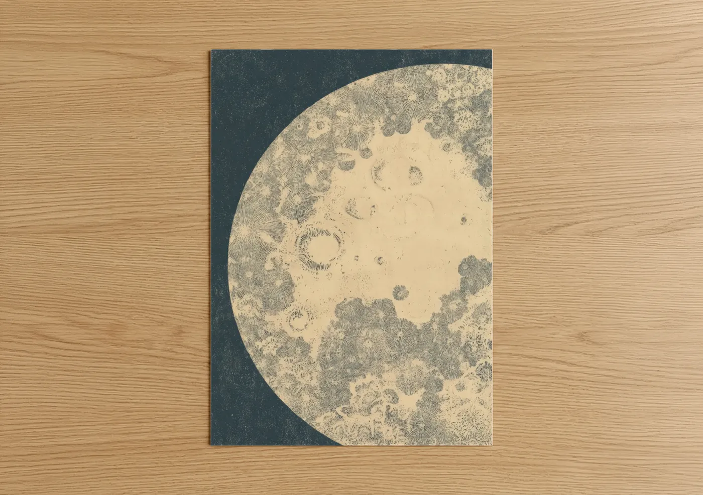 Art print on warm oak wood — cream and dark blue palette — Cratered Moon poster