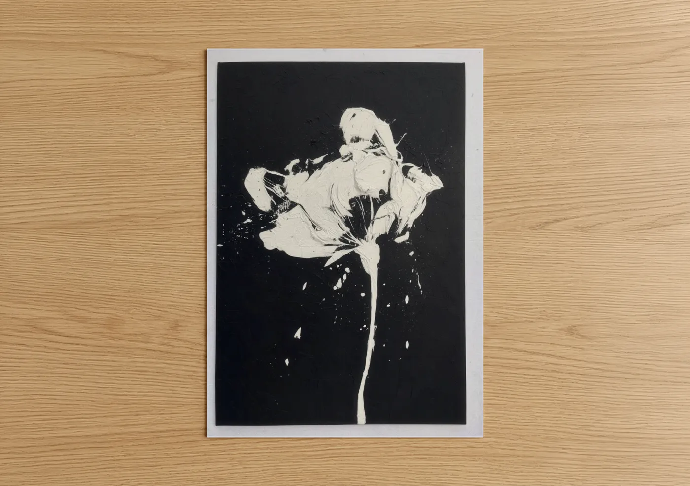 Abstract flower art print on warm oak wood — black and white palette — Monochrome Blossom poster