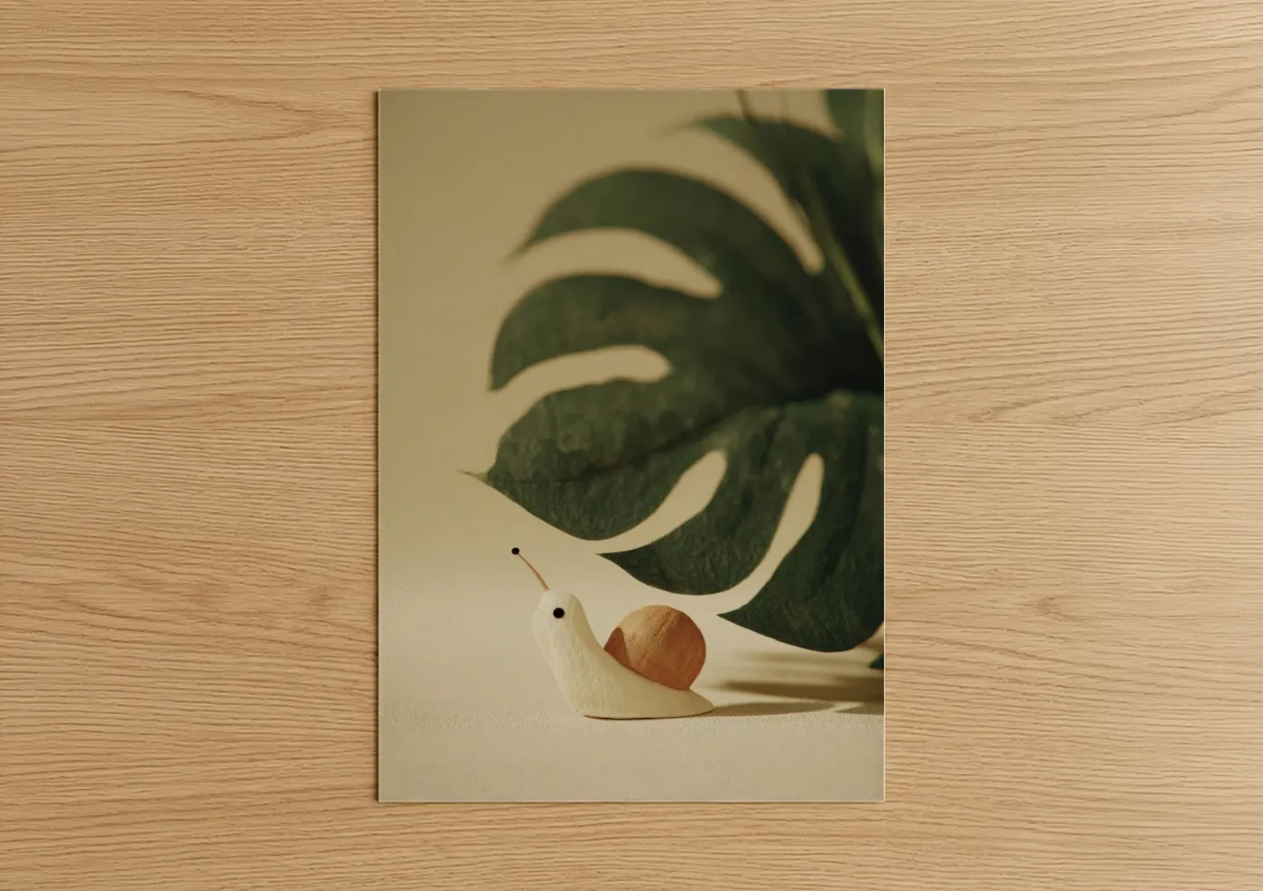 Cream Snail With Monstera Leaf Wall Art