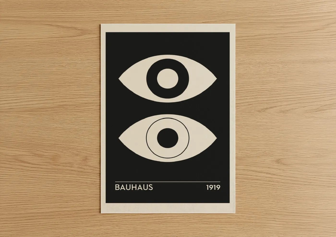Abstract geometric art print on warm oak wood — black and white and cream palette — Dual Vision Eyes poster