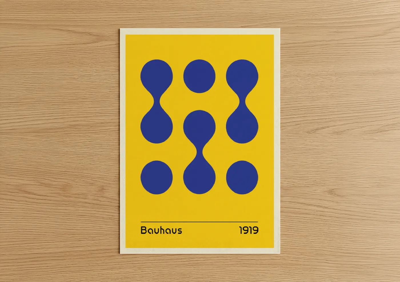 Abstract geometric art print on warm oak wood — yellow and royal blue palette — Bauhaus Circles poster