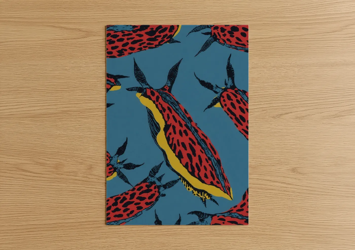 Art print on warm oak wood — red and blue palette — Crimson Nudibranch poster