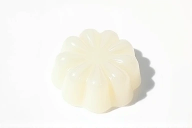 Transparent konjac jelly on a clean white surface.