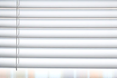 Clean, dust-free blinds in natural light.