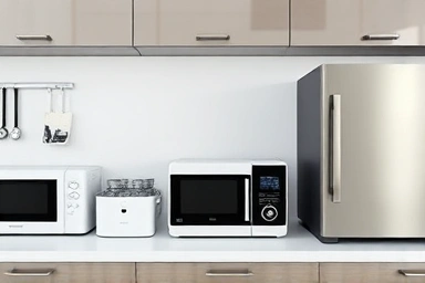 Close-up of sleek kitchen appliances in various colors