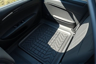 Car seat with kick mat protection from child footprints.