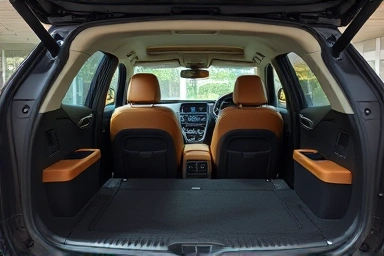 Luxurious and practical interior of an SUV coupe, emphasizing comfort and space.