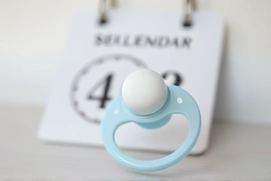 Symbolic representation of timely pacifier replacement for baby's health.