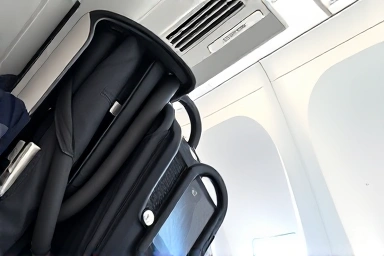 Compact stroller fitting into airplane overhead bin