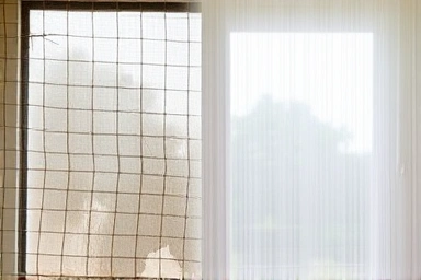 Old vs new window screen, highlighting air quality improvement