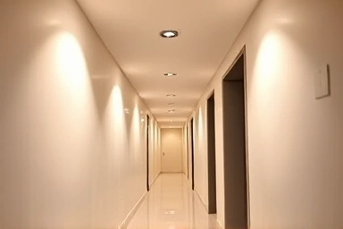 Expansive narrow hallway with strategic lighting