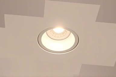 Perfectly installed recessed light in a clean ceiling.