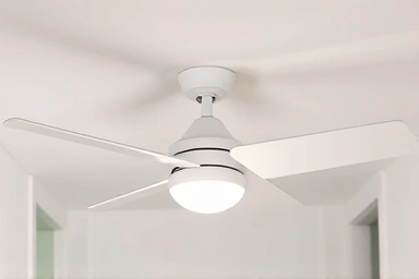 Sleek ceiling fan light fixture in a narrow space
