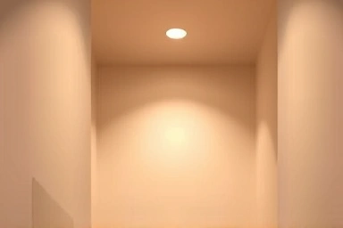 Indirect lighting technique making a small room's ceiling appear higher.