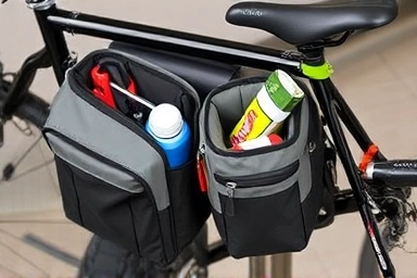 Organized bicycle bags packed with cycling essentials.
