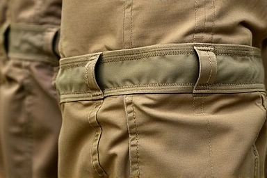 Close-up on cargo pants pocket details and fabric textures.