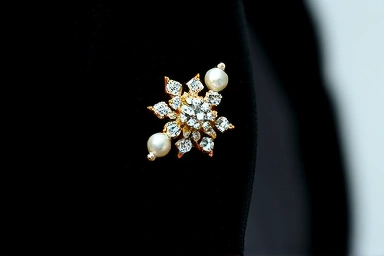 Elegant safety pin brooch on velvet blazer lapel.