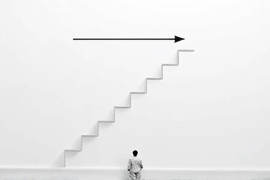 Staircase with top steps capped, symbolizing tax burden limit