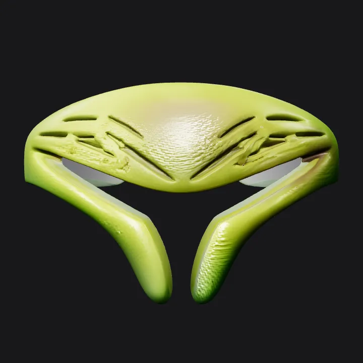 Green ornamental ring with geometric cutouts. smooth edges, complex geometry, symmetric geometry.