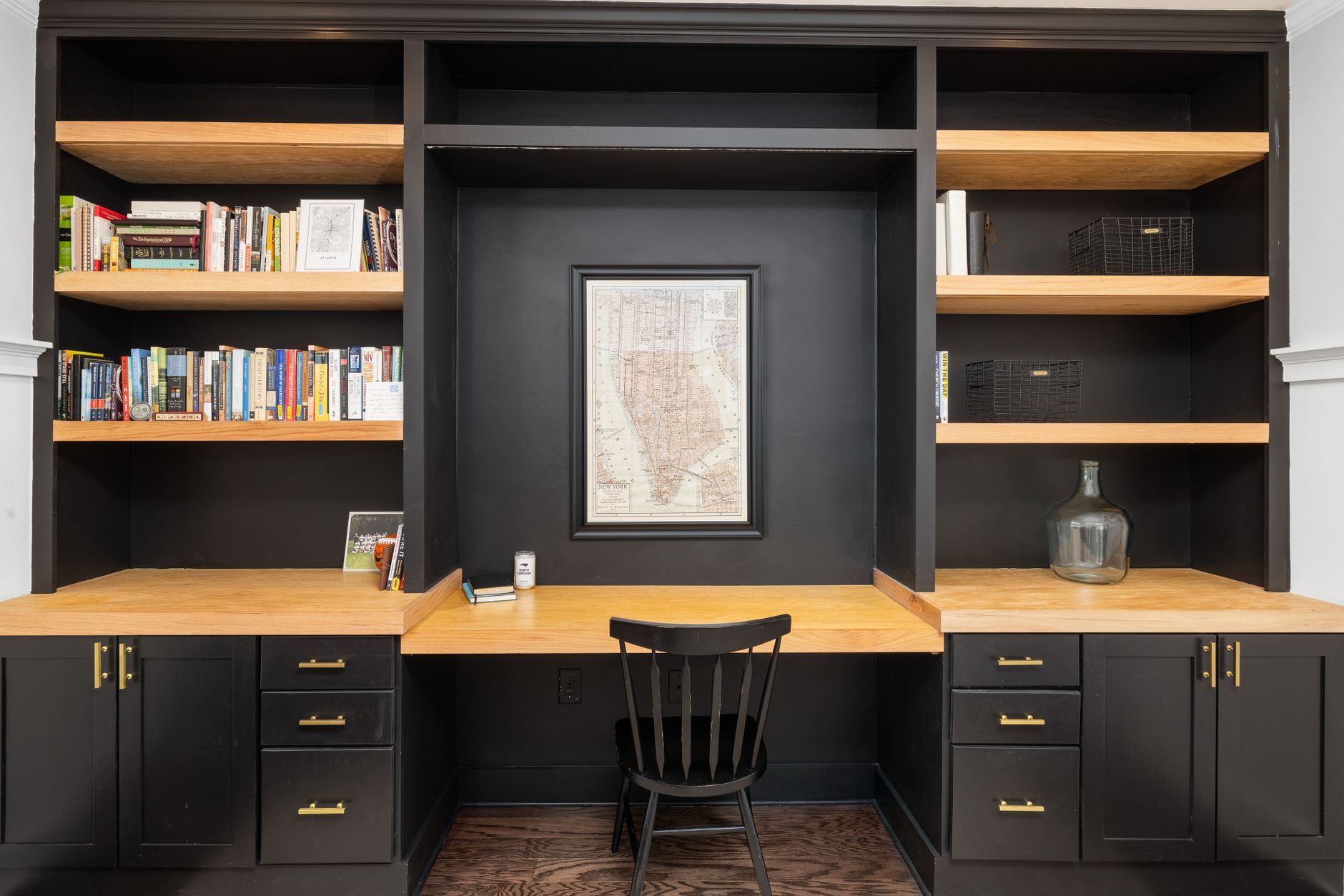 a custom millwork library with built-in shelving in a New York home