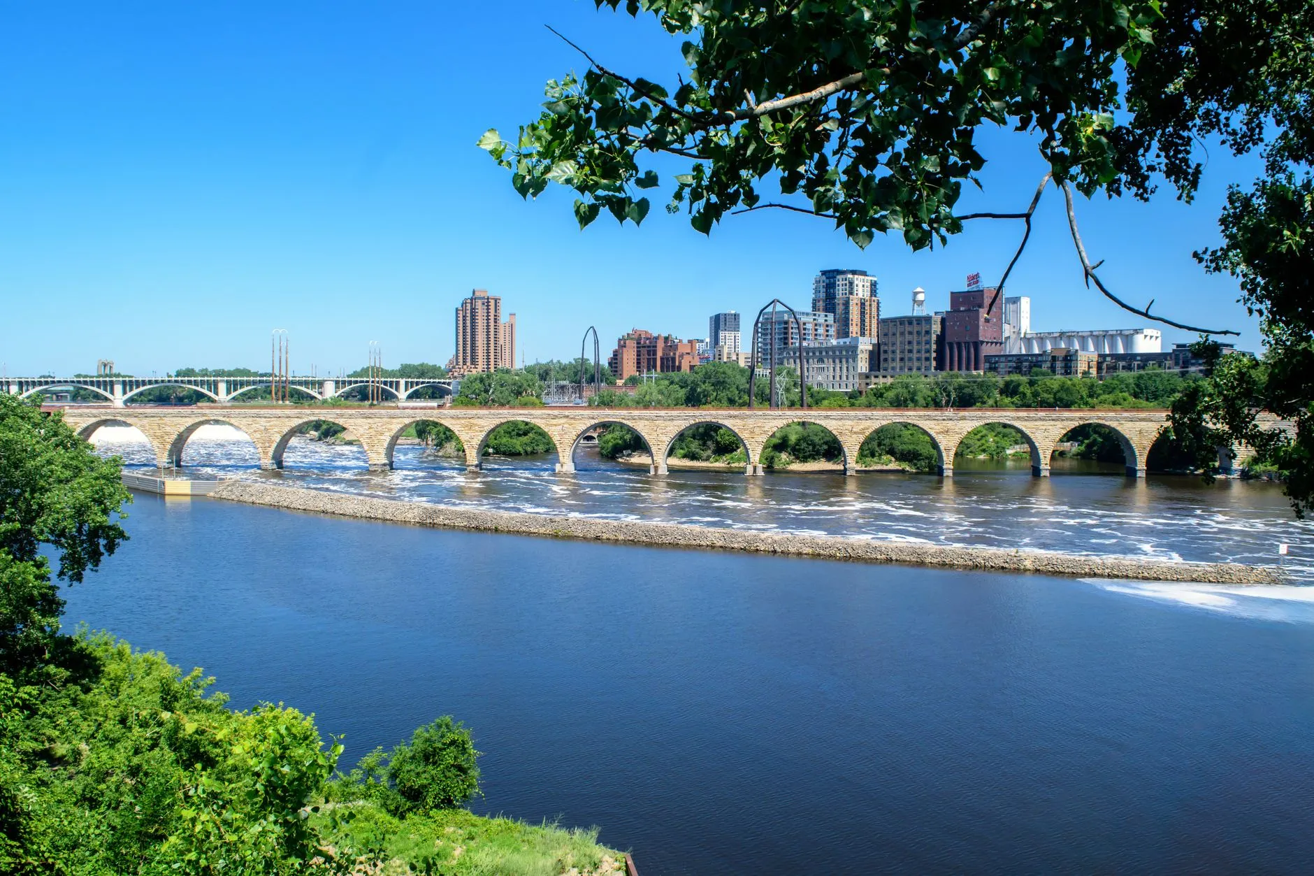 the Minneapolis skyline seen from the Stone Arch Bridge