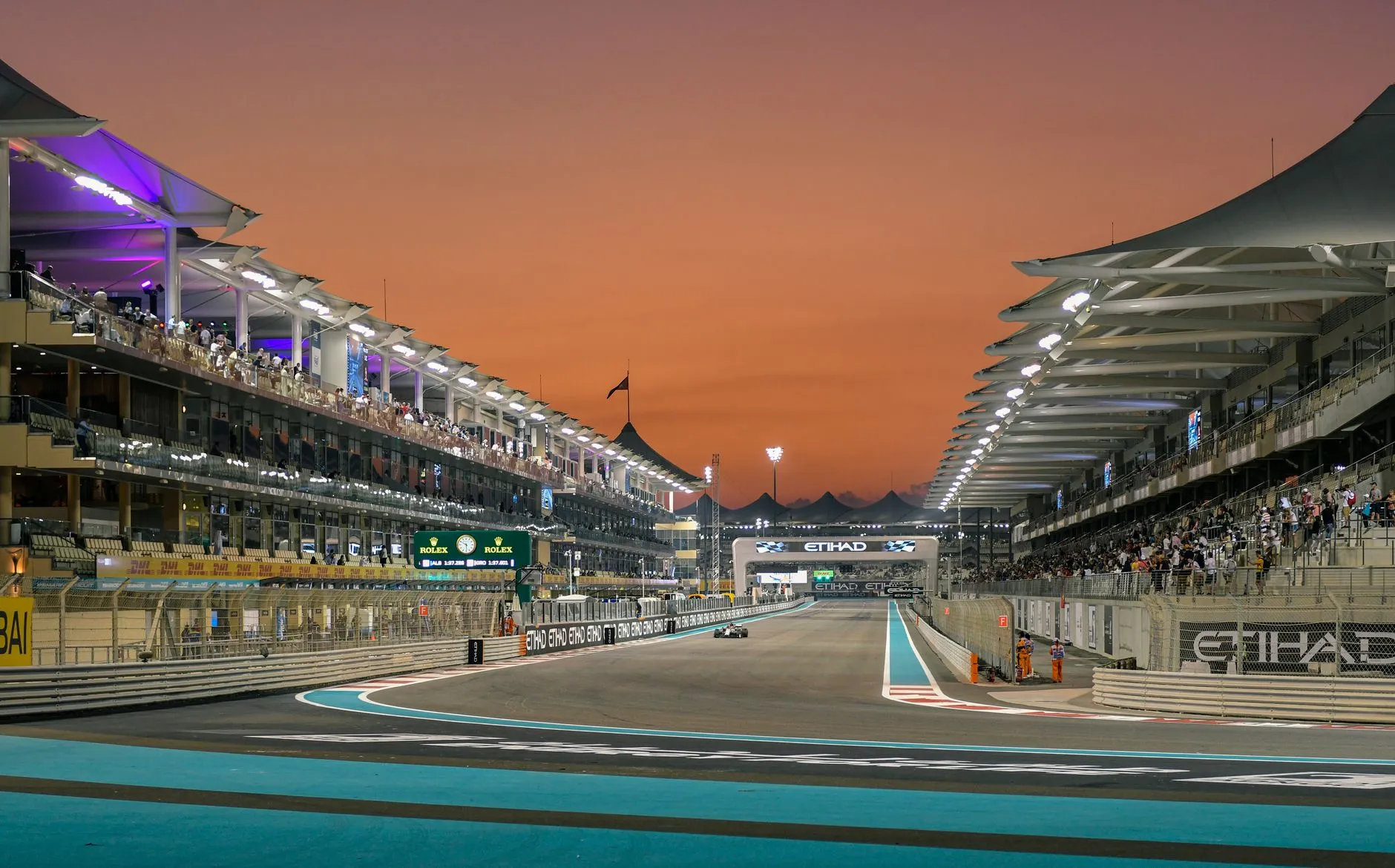 a race circuit under lights at night