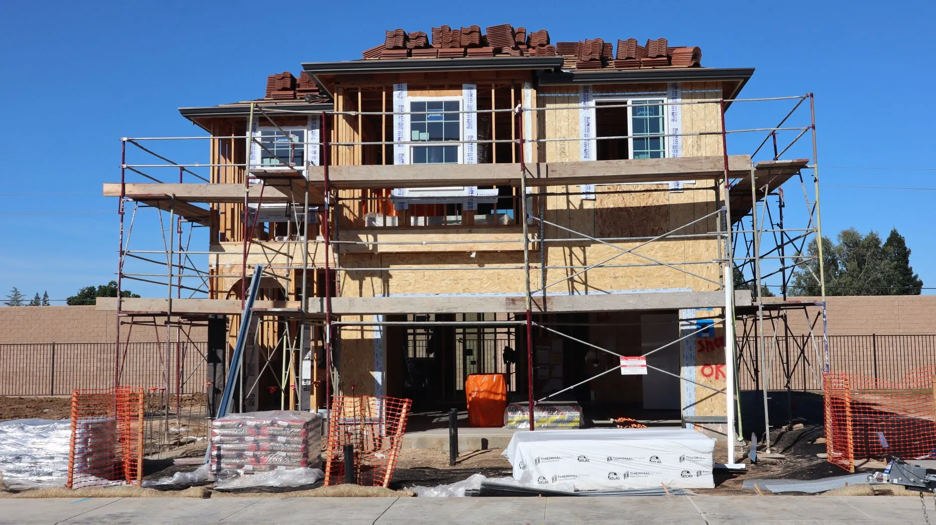a new home under construction with wood framing