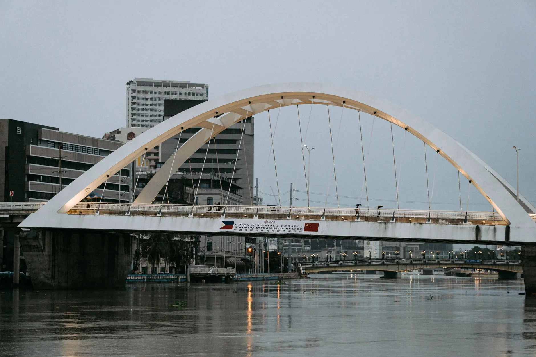 a concrete bridge over a river