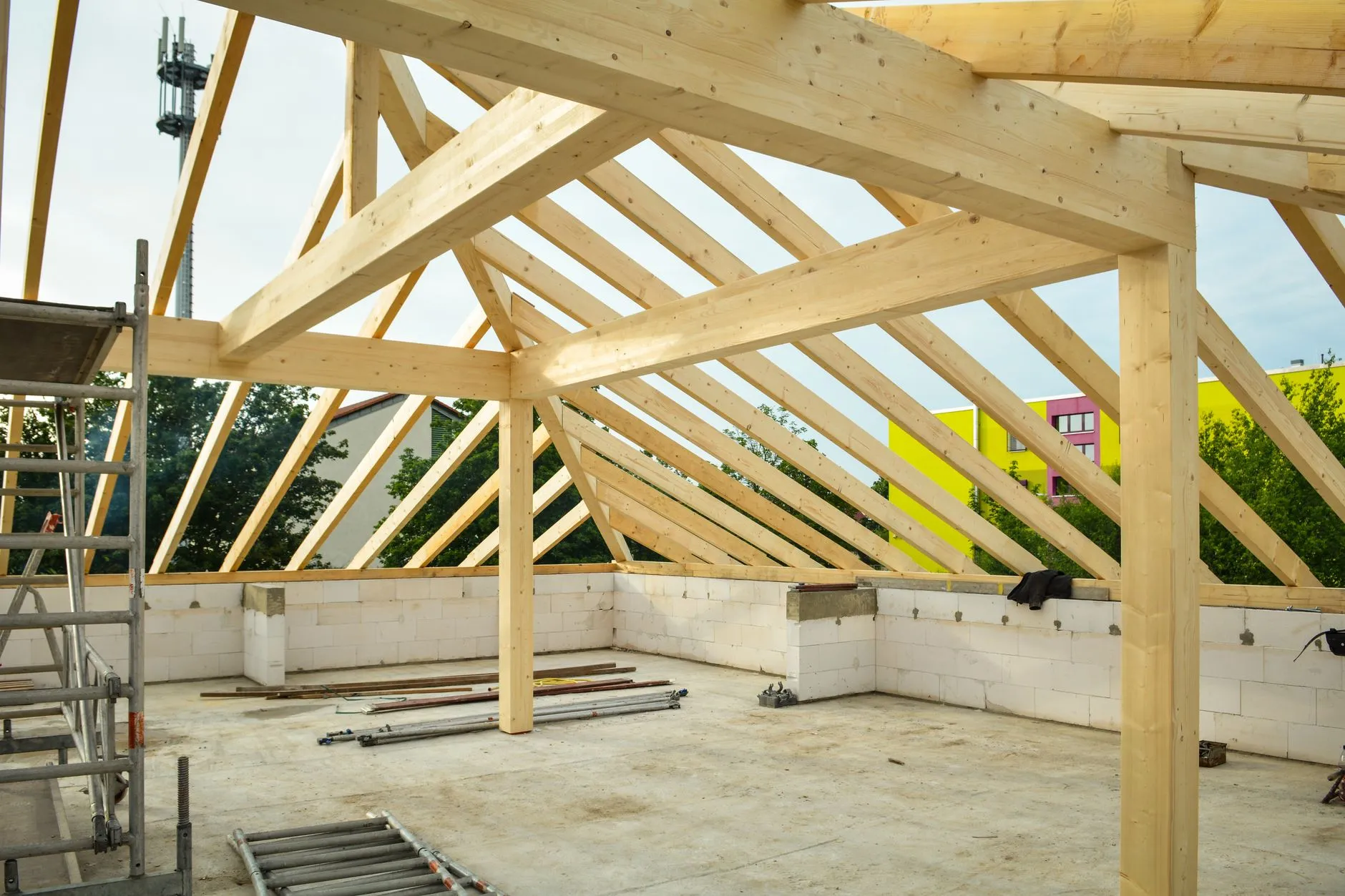 a new timber roof structure with exposed beams
