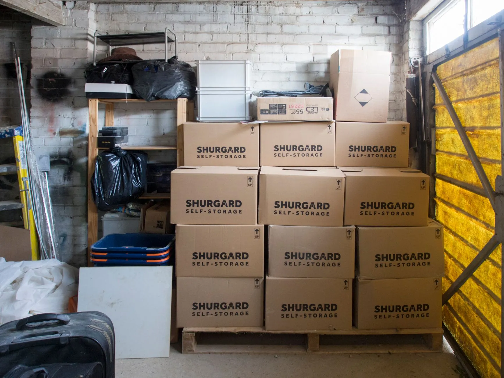 packed attic full of boxes and storage