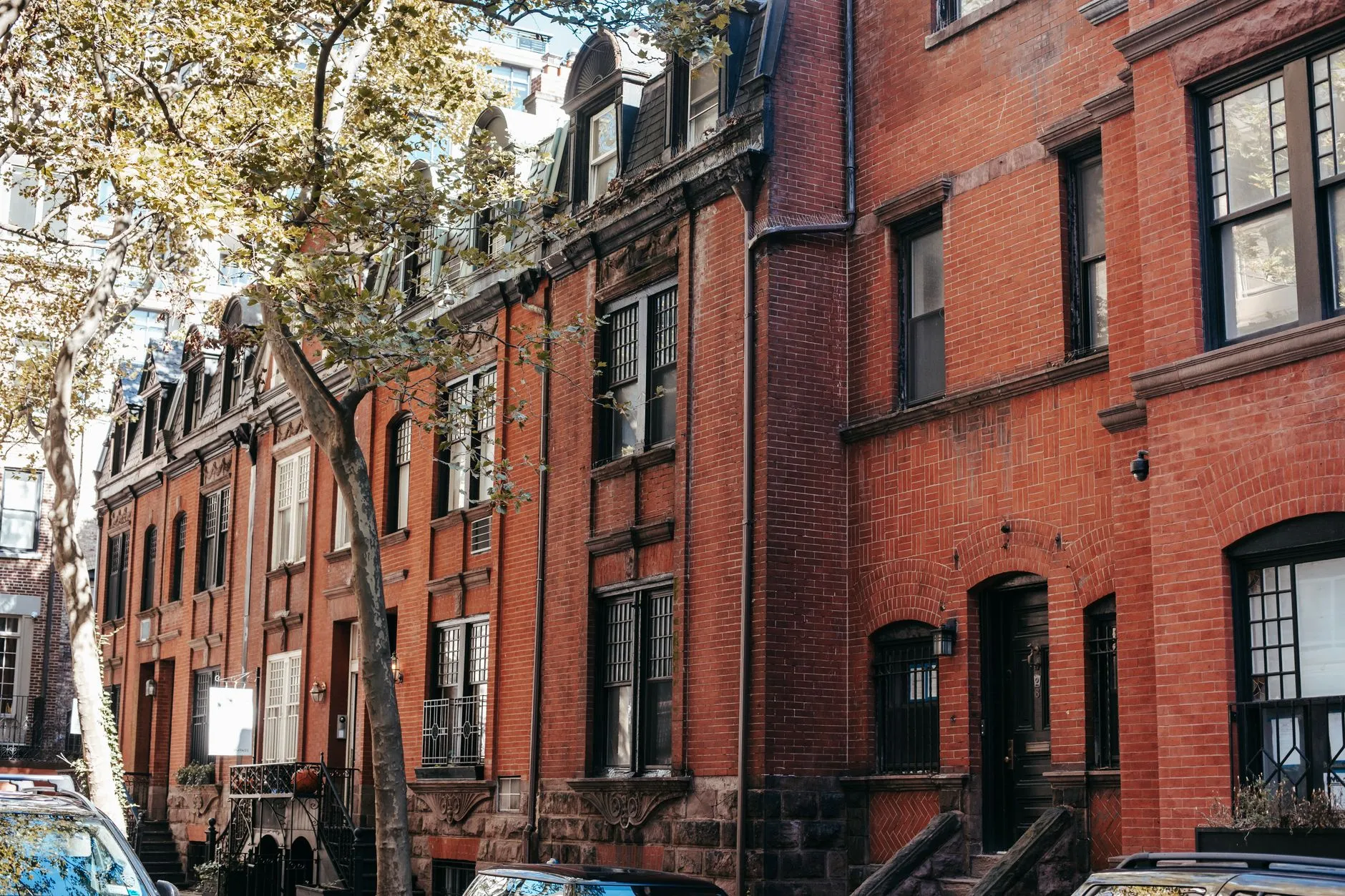 brick row houses along a residential street