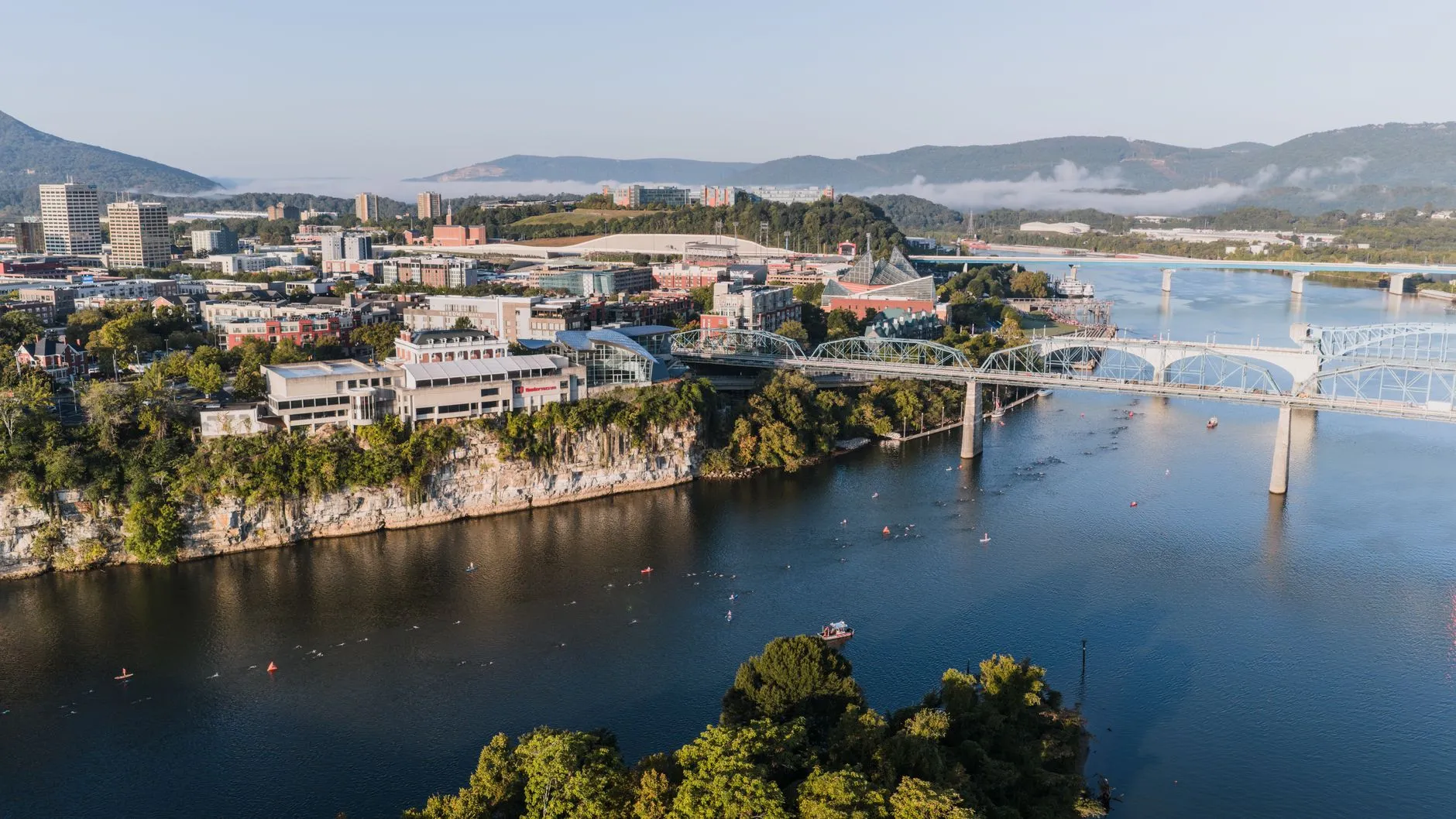 an aerial view of downtown Chattanooga and the Tennessee River