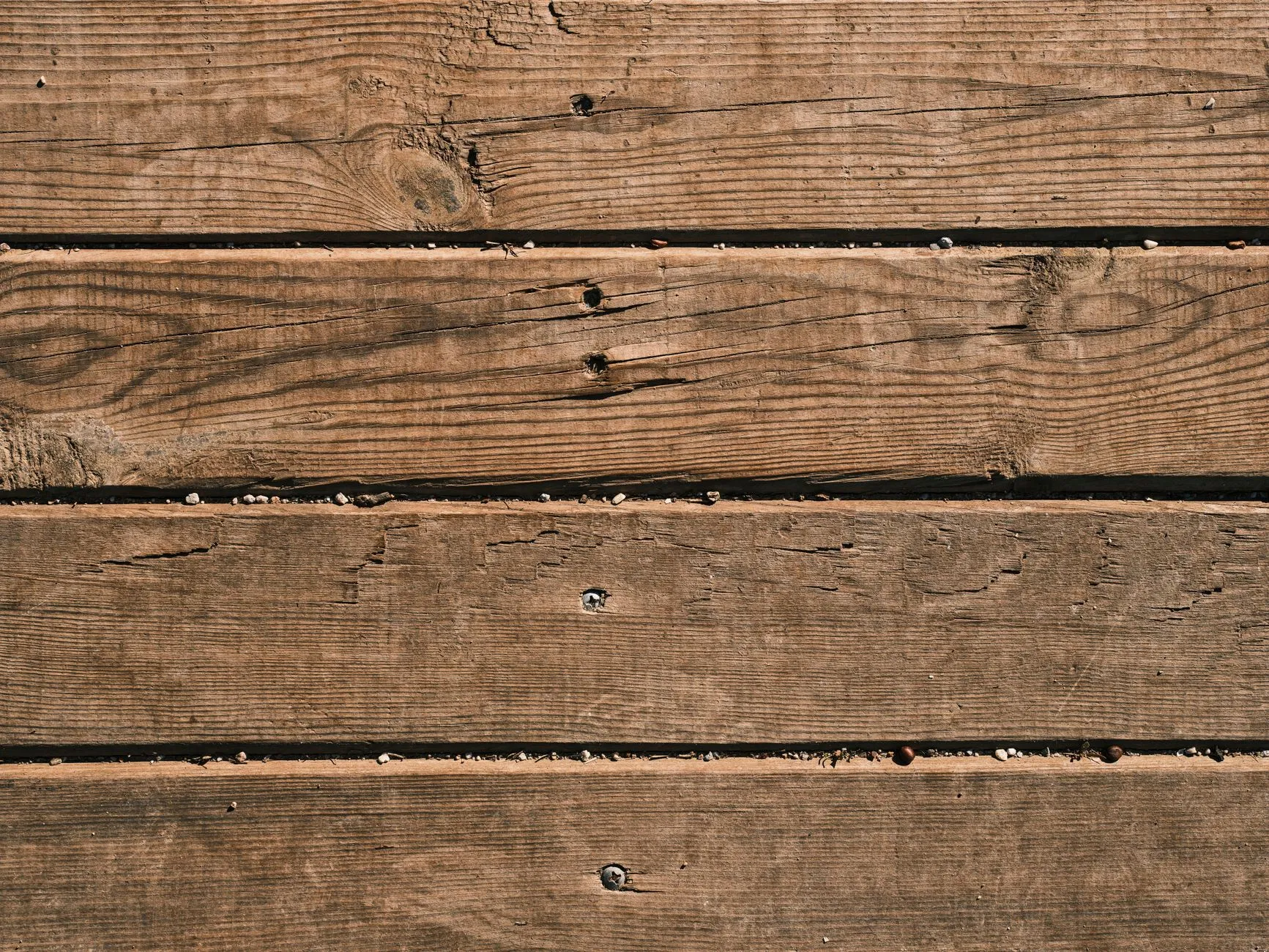 semi-transparent stained deck boards showing wood grain