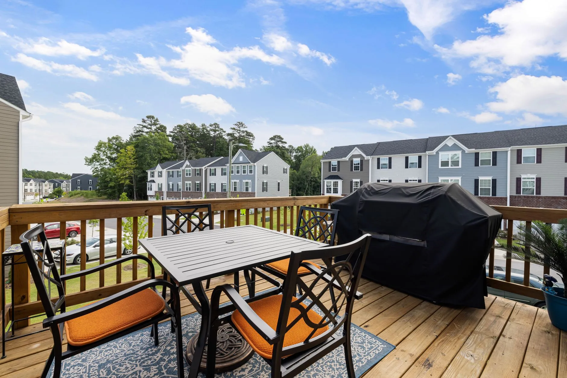 freshly stained wood deck with rich warm tone and railing