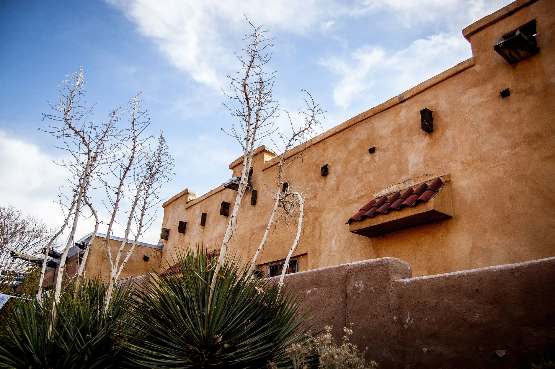 warm adobe stucco home exterior