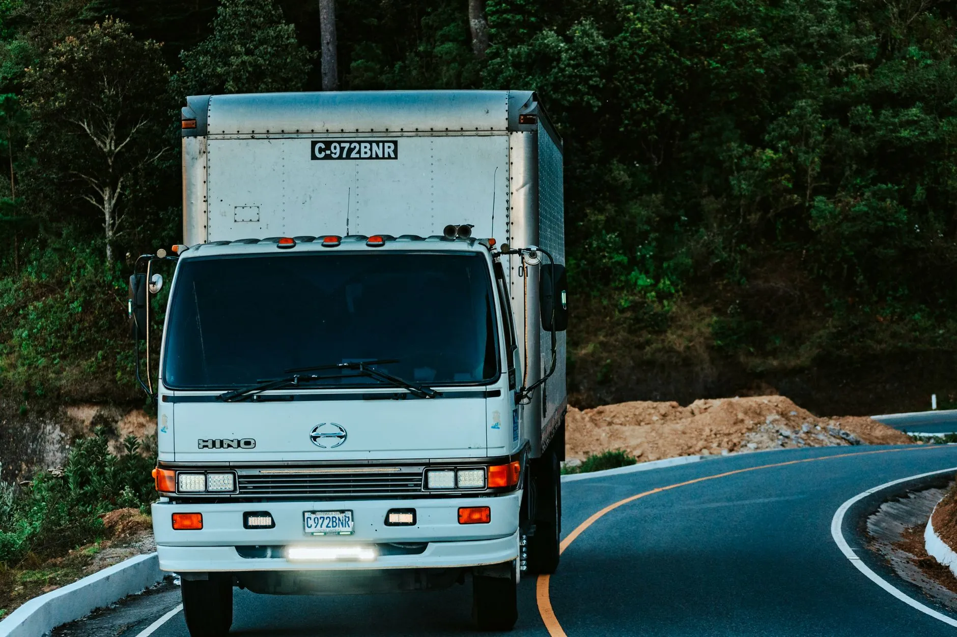 clean white box truck on the road