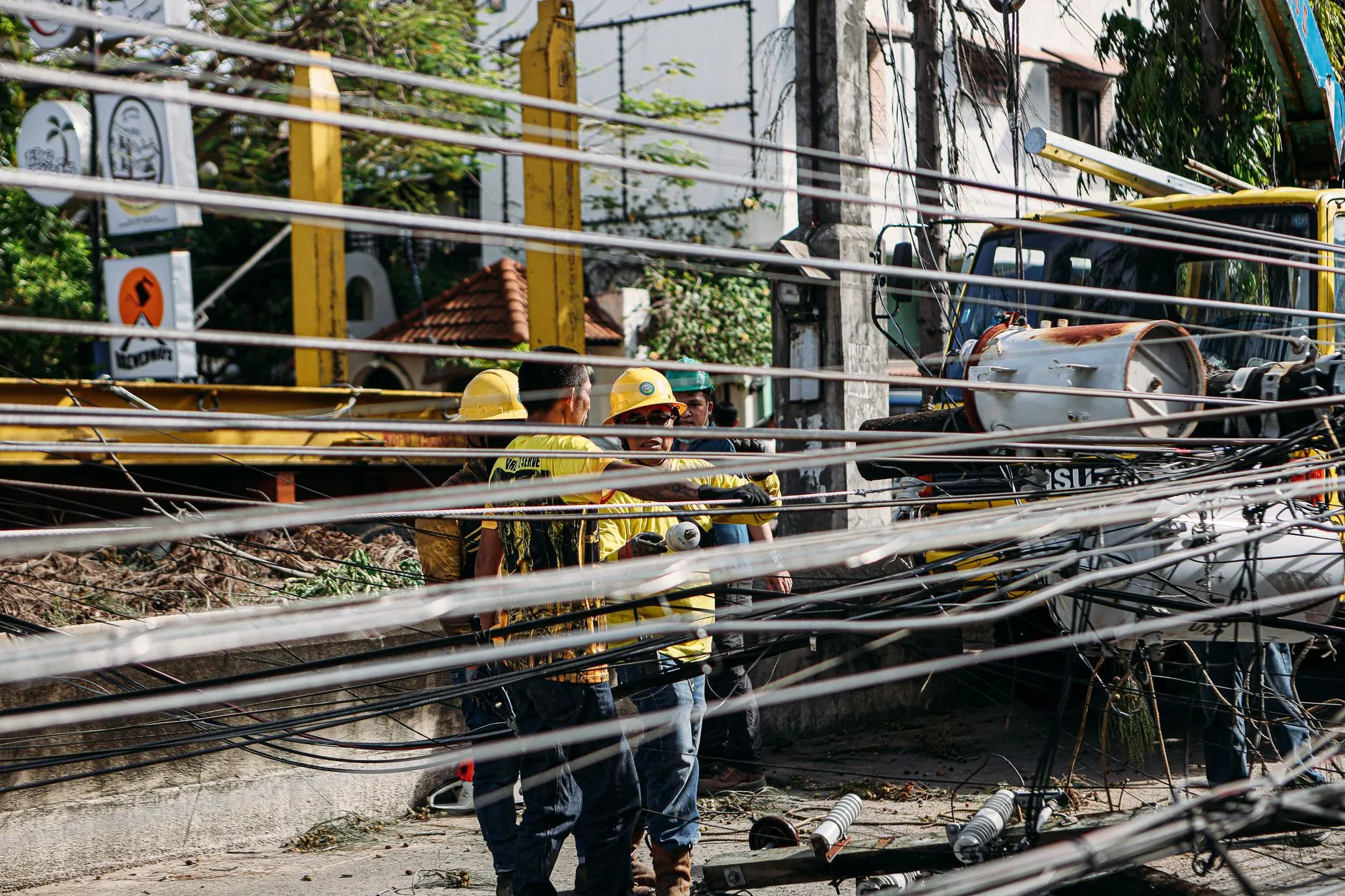 a crew clearing vegetation along a utility right-of-way