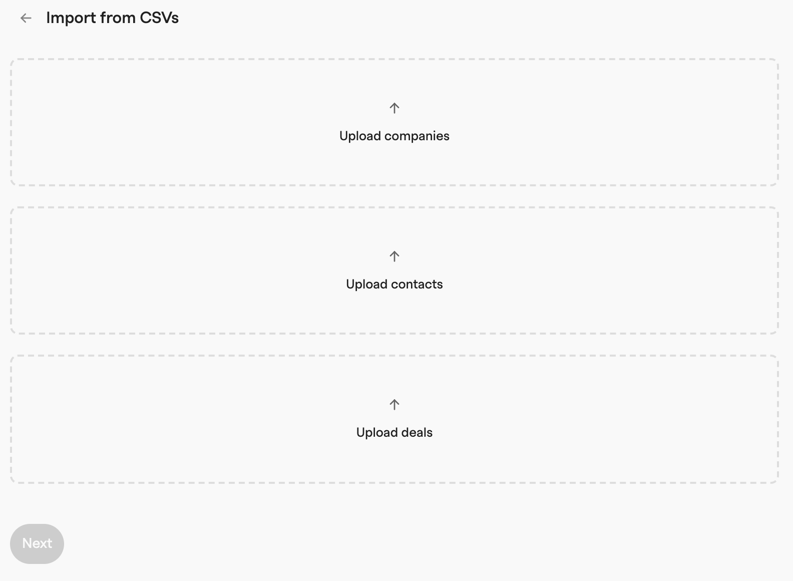 Import from CSVs screen with three dashed upload areas for companies, contacts and deals above a Next button