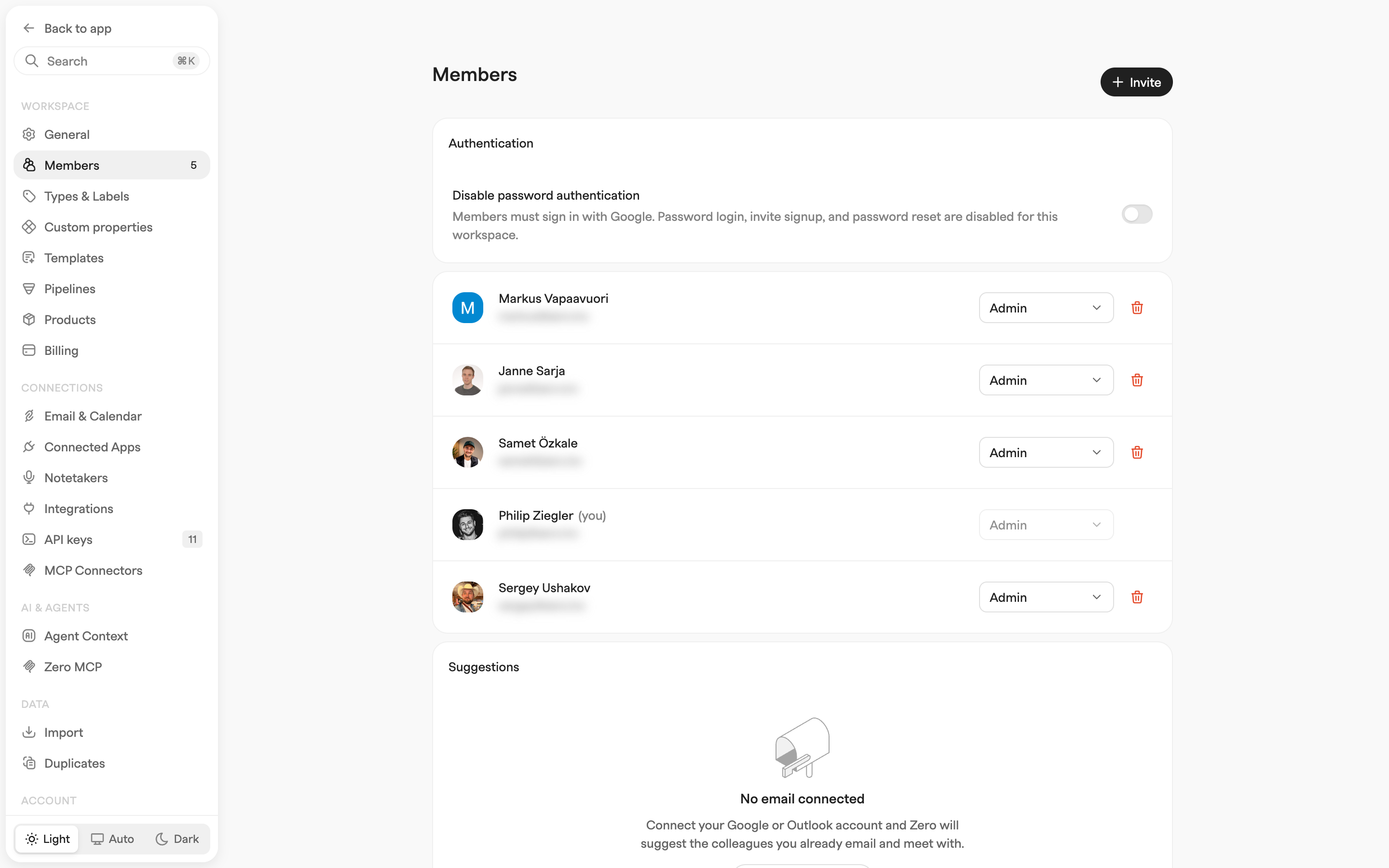 Workspace Members settings listing team members with their roles, above an authentication toggle and a suggestions panel
