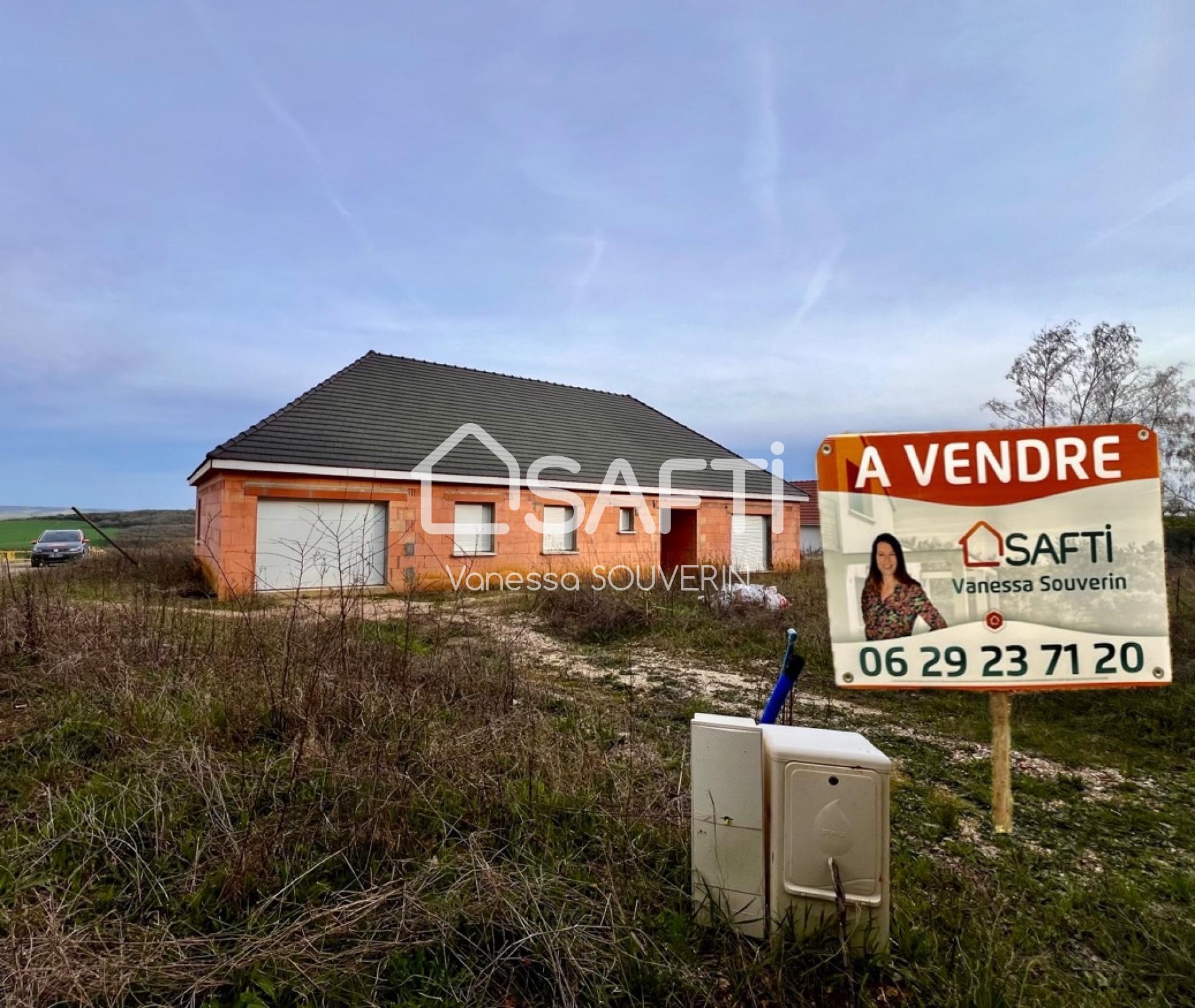 Vaste maison avec garage en cours de construction