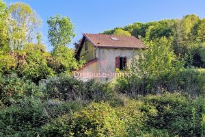 Maisonnette à rénover avec terrain