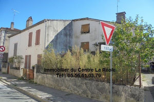 Ensemble immobilier avec 2 maisons, garage et jardin 