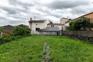 Maison de bourg avec terrain 